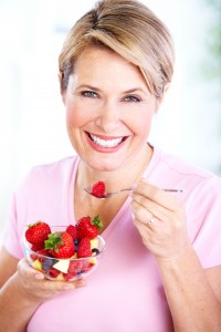 Senior woman with a salad. Diet.